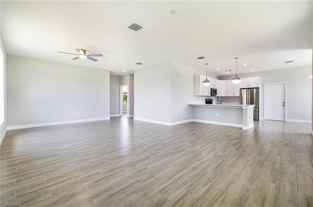 1909 Moore AVE, Lehigh Acres, FL 33972