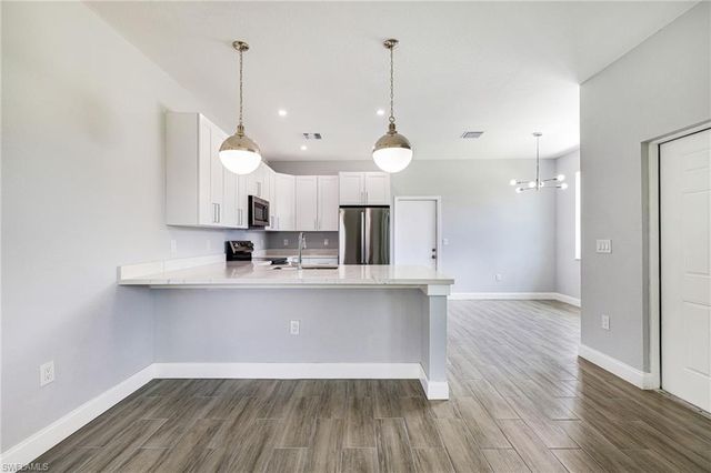 1909 Moore AVE, Lehigh Acres, FL 33972