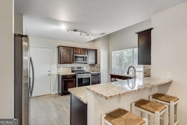5557 BRIDGE POINTE Drive, Alpharetta, GA 30005