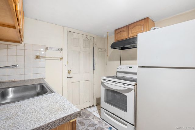 120-38 Inwood Street, Jamaica, NY 11436