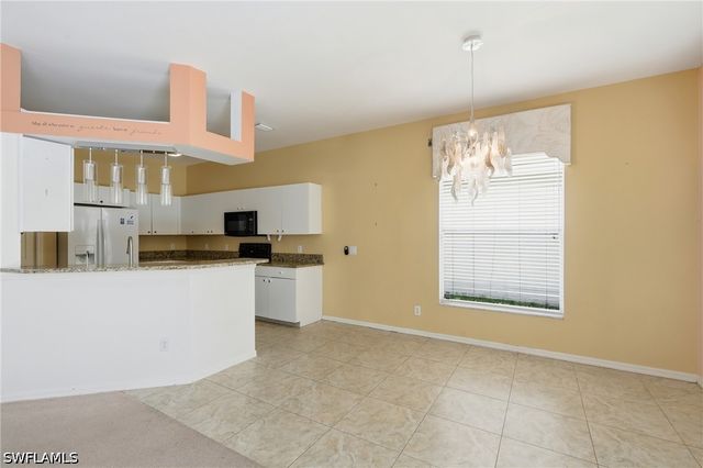 295 Stanhope CIR, Naples, FL 34104