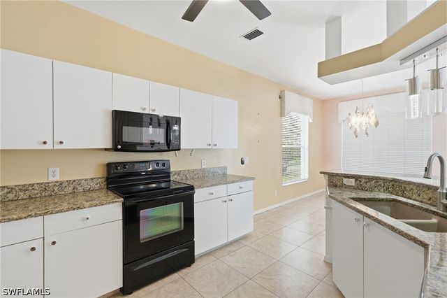 295 Stanhope CIR, Naples, FL 34104