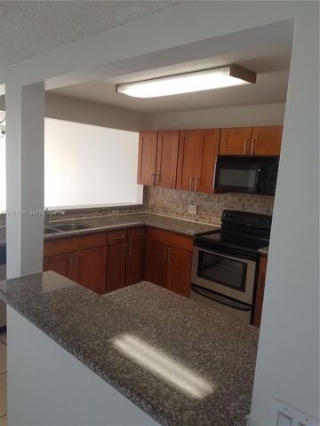 310 Racquet Club Rd 204, Weston, FL 33326