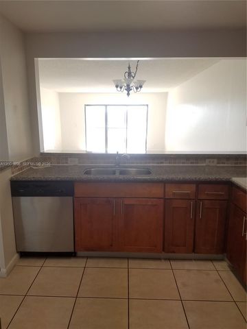 310 Racquet Club Rd 204, Weston, FL 33326