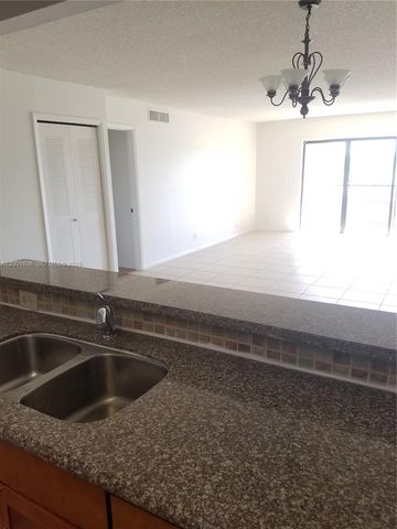 310 Racquet Club Rd 204, Weston, FL 33326