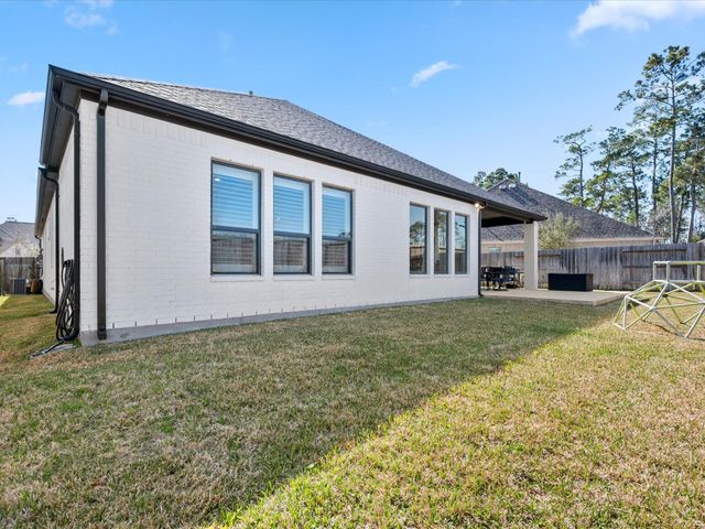 605 Ashbrook Ridge Lane, Pinehurst, TX 77362