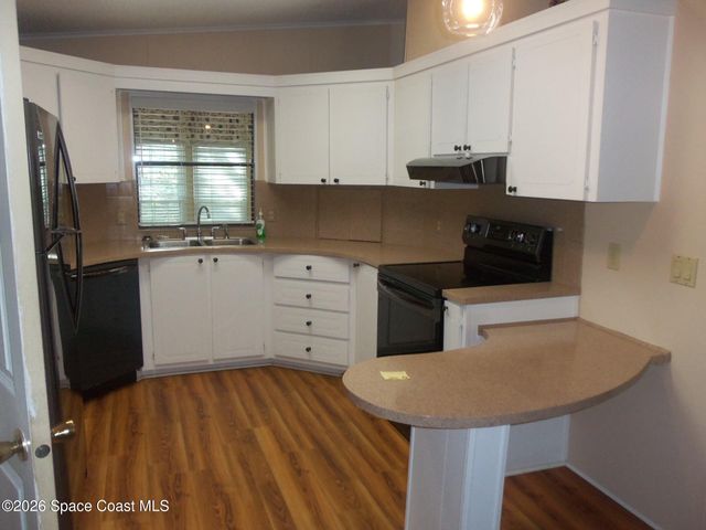 630 Wedelia Drive, Barefoot Bay, FL 32976