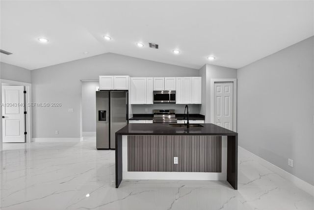 704 E Carbon, Lehigh Acres, FL 33974