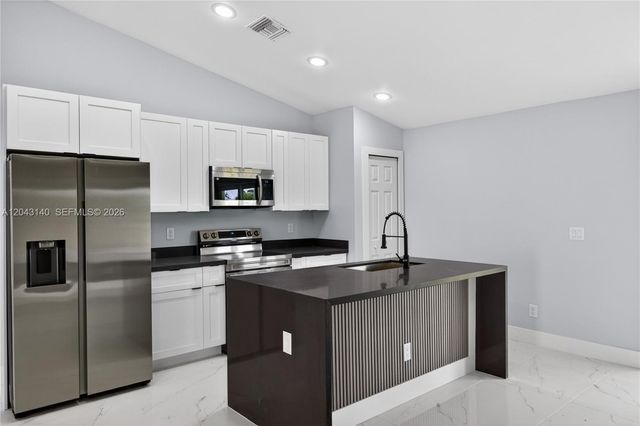 704 E Carbon, Lehigh Acres, FL 33974