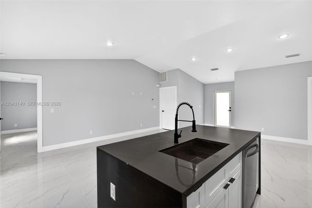 704 E Carbon, Lehigh Acres, FL 33974