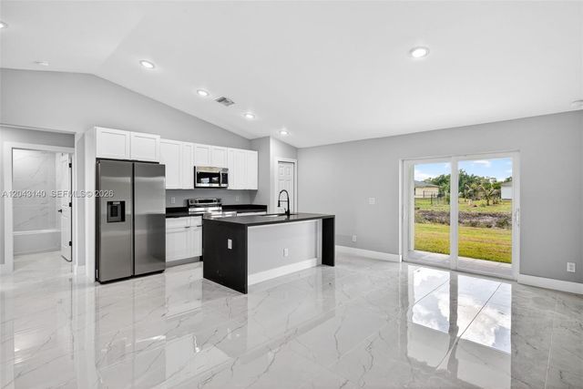 704 E Carbon, Lehigh Acres, FL 33974