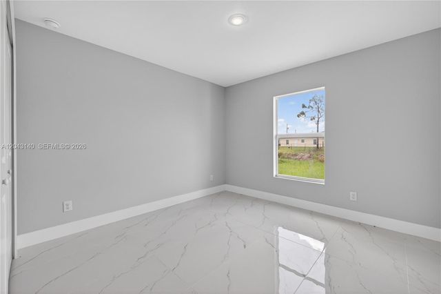 704 E Carbon, Lehigh Acres, FL 33974