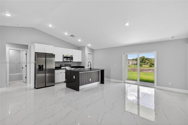 704 E Carbon, Lehigh Acres, FL 33974