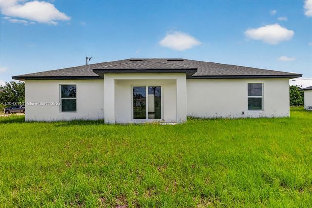 704 E Carbon, Lehigh Acres, FL 33974