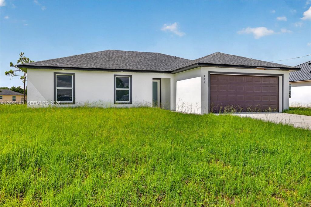 704 E Carbon, Lehigh Acres, FL 33974
