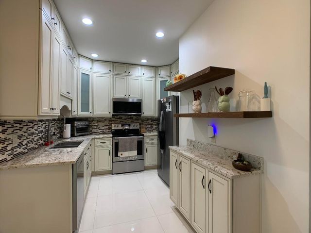 10465 Mateo Court, Boca Raton, FL 33498