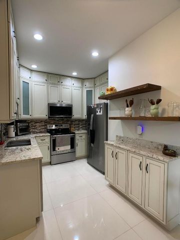 10465 Mateo Court, Boca Raton, FL 33498