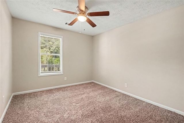 911 Riverstone Way, Woodstock, GA 30188