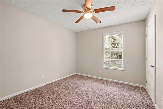 911 Riverstone Way, Woodstock, GA 30188