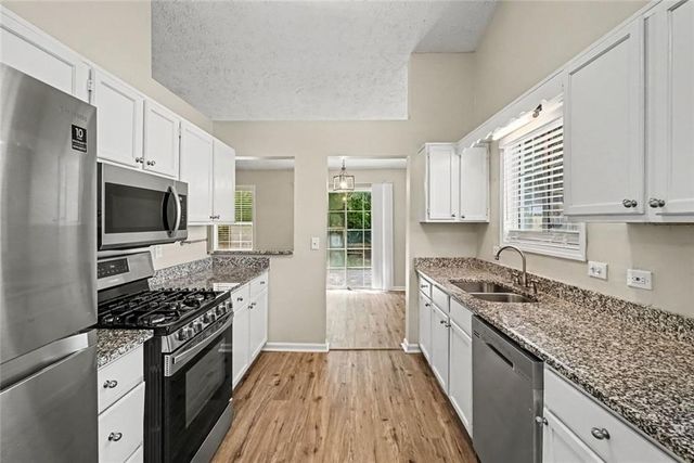 911 Riverstone Way, Woodstock, GA 30188