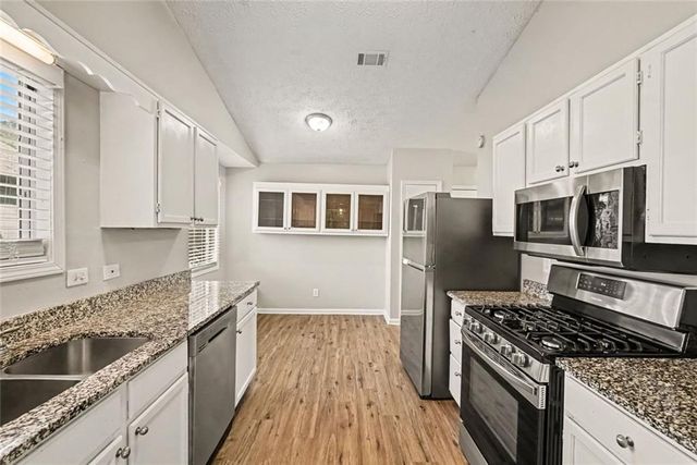 911 Riverstone Way, Woodstock, GA 30188