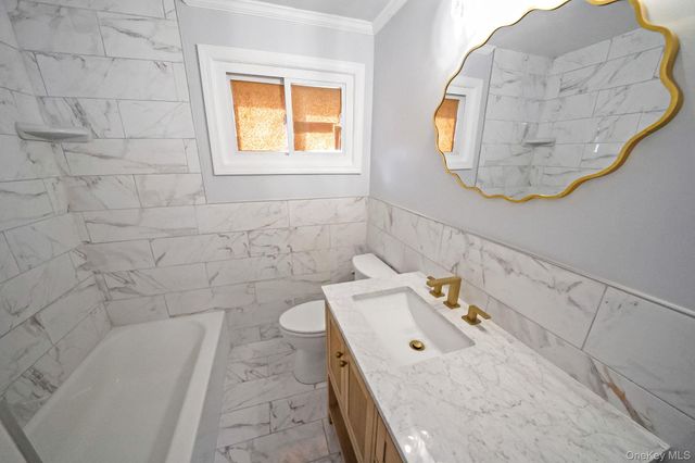 17 Denton Place, Roosevelt, NY 11575