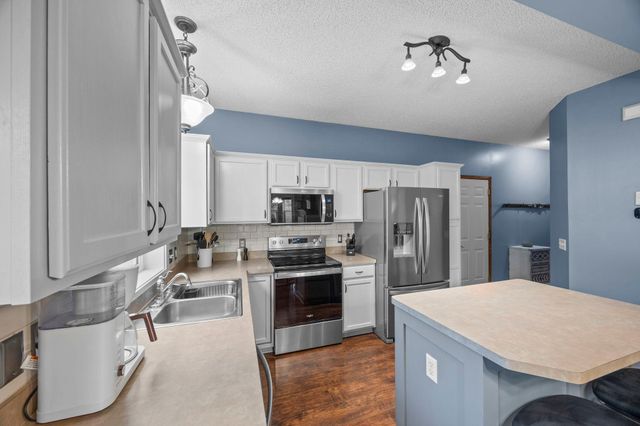 12122 Yancy Street NE D, Blaine, MN 55449