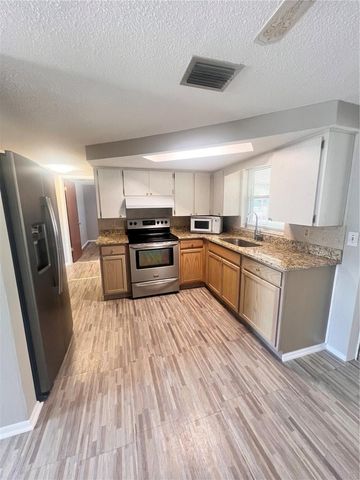 9910 LAKE CHRISE LANE, Port Richey, FL 34668