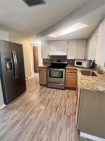 9910 LAKE CHRISE LANE, Port Richey, FL 34668