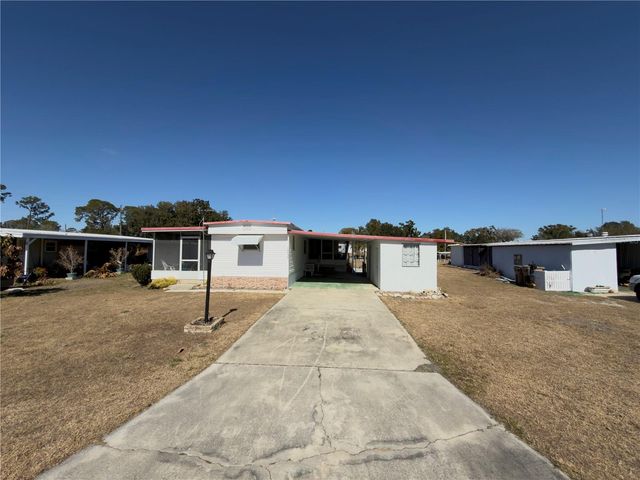 12033 LAKE PINES ROAD, Leesburg, FL 34788