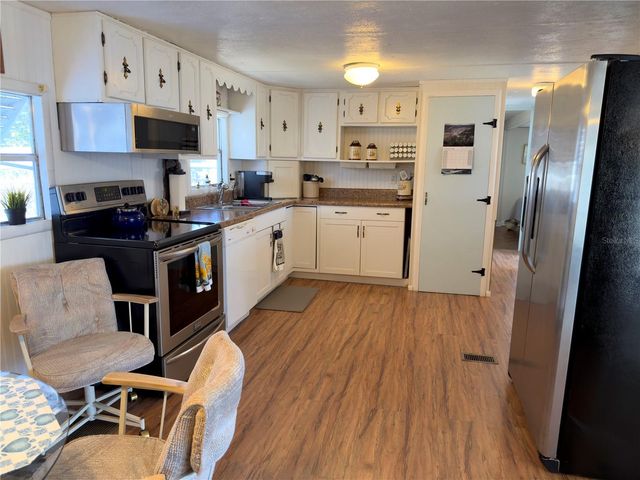 12033 LAKE PINES ROAD, Leesburg, FL 34788