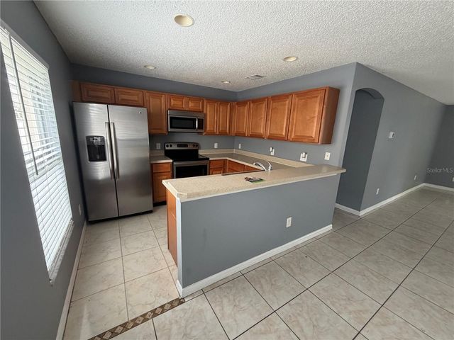 2413 RUDDENSTONE WAY, Kissimmee, FL 34744