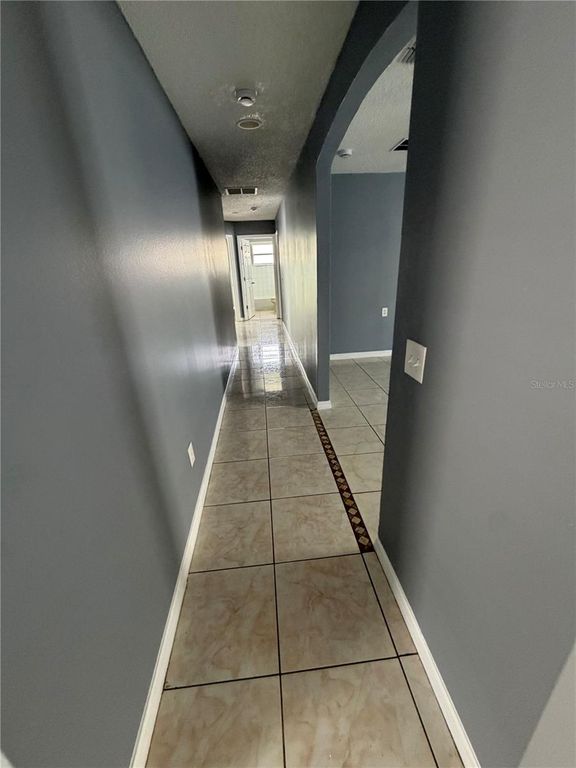 Image 13 of property listing at 2413 RUDDENSTONE WAY, Kissimmee, FL 34744