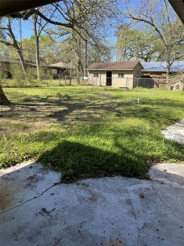 12203 Hickory Hollow Lane, Pinehurst, TX 77362