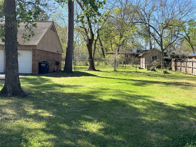 12203 Hickory Hollow Lane, Pinehurst, TX 77362