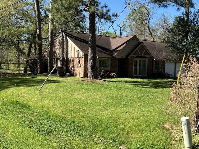 12203 Hickory Hollow Lane, Pinehurst, TX 77362