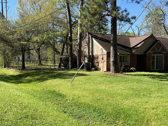 12203 Hickory Hollow Lane, Pinehurst, TX 77362