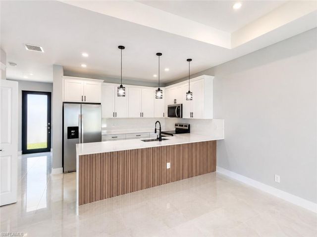 123 Jenna AVE S, Lehigh Acres, FL 33973