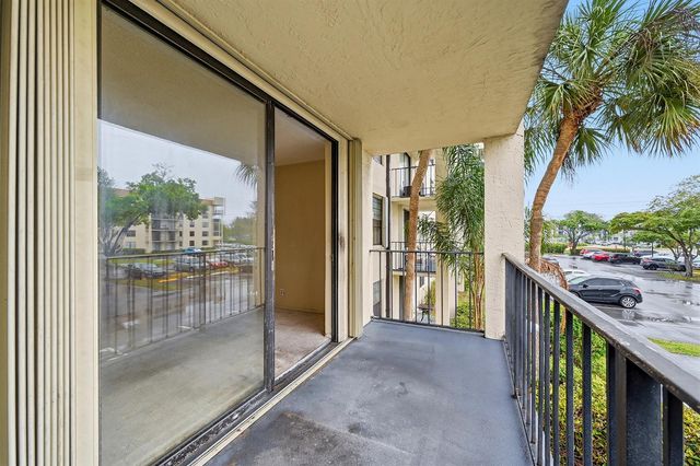 6195 Rock Island Road 210, Tamarac, FL 33319