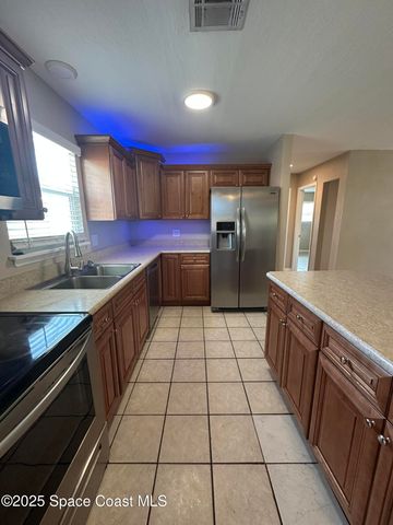 660 Belvedere Road NW, Palm Bay, FL 32907