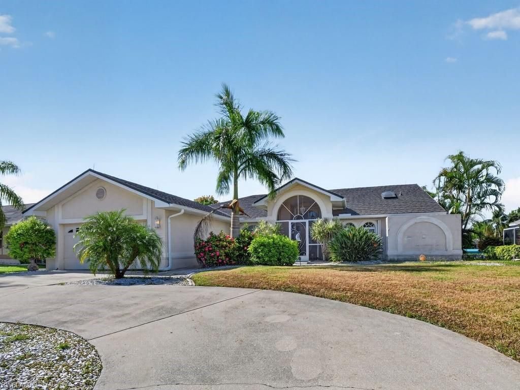 1302 SE 12th TER, CAPE CORAL, FL 33990 — exterior