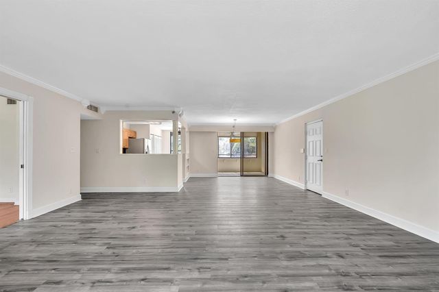 7564 Regency Lake Drive 202, Boca Raton, FL 33433