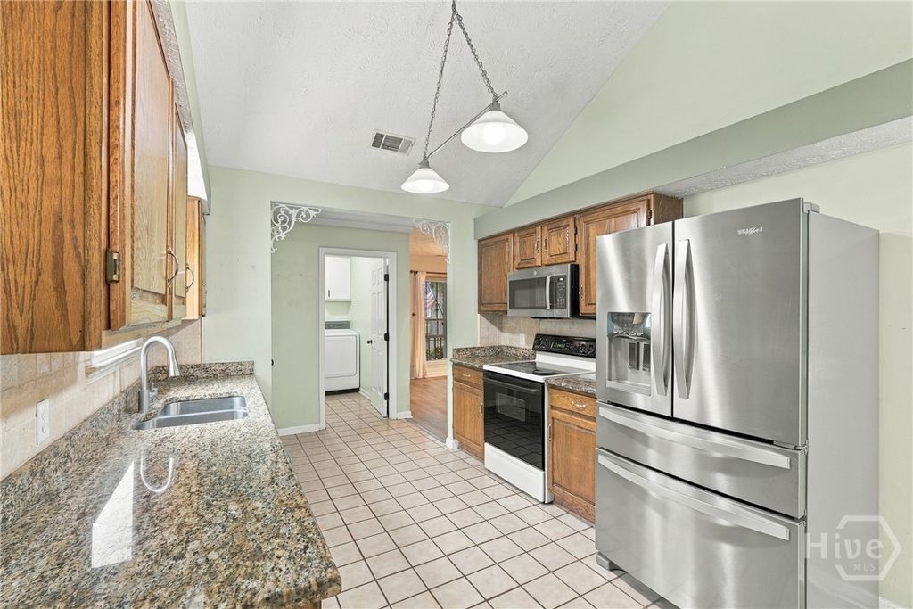 Image 11 of property listing at 228 Davis Road, Richmond Hill, GA 31324