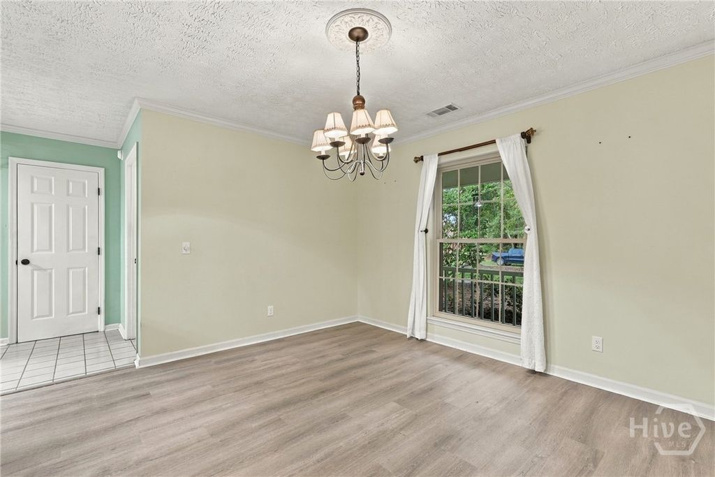Image 18 of property listing at 228 Davis Road, Richmond Hill, GA 31324