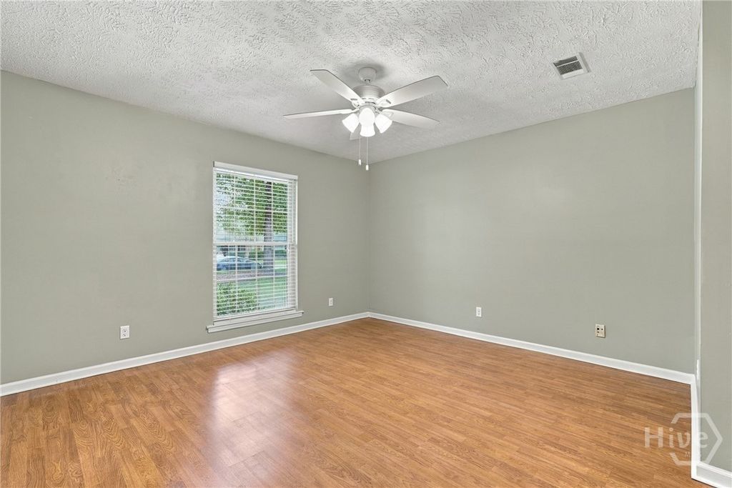 Image 25 of property listing at 228 Davis Road, Richmond Hill, GA 31324