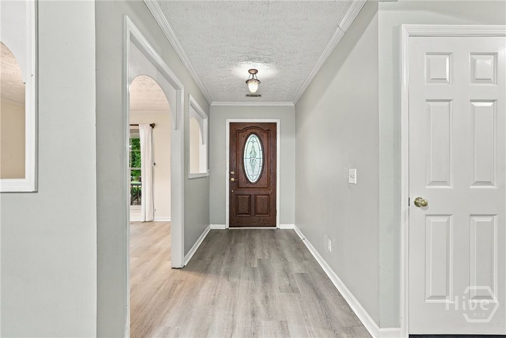 Image 6 of property listing at 228 Davis Road, Richmond Hill, GA 31324