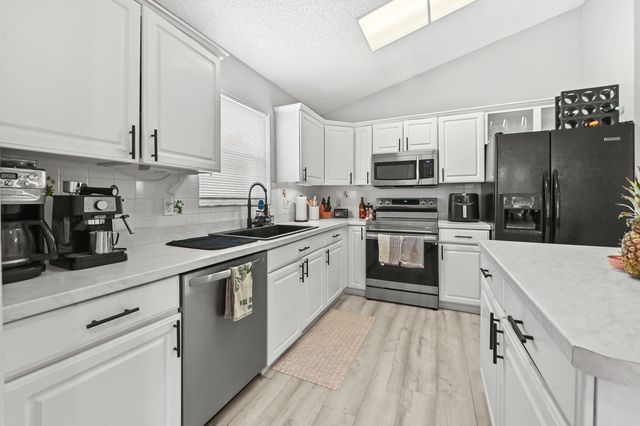 320 Hammocks Trail, Greenacres, FL 33413