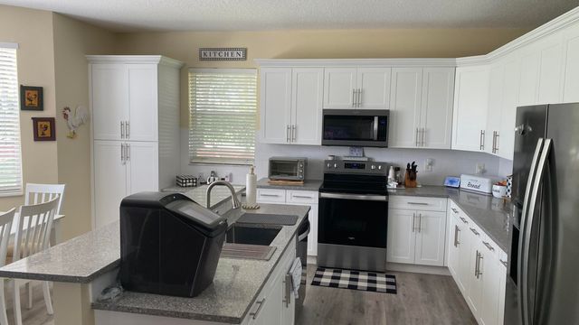 7650 OAK GROVE Circle, Lake Worth, FL 33467