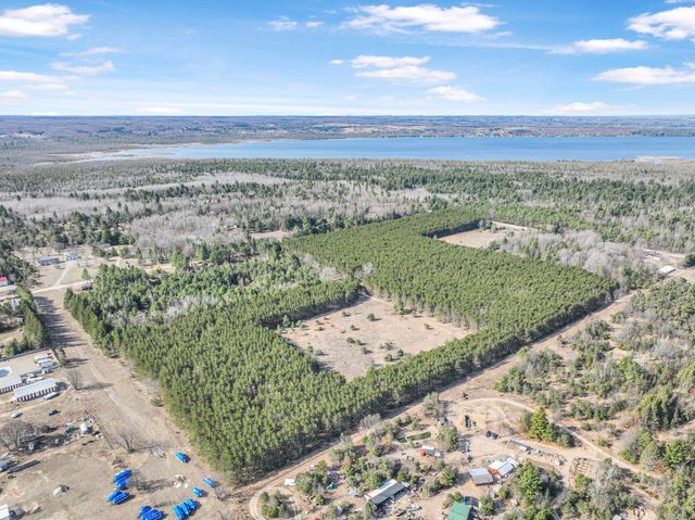 7020 NW Round Lake Road, Rapid City, MI 49676