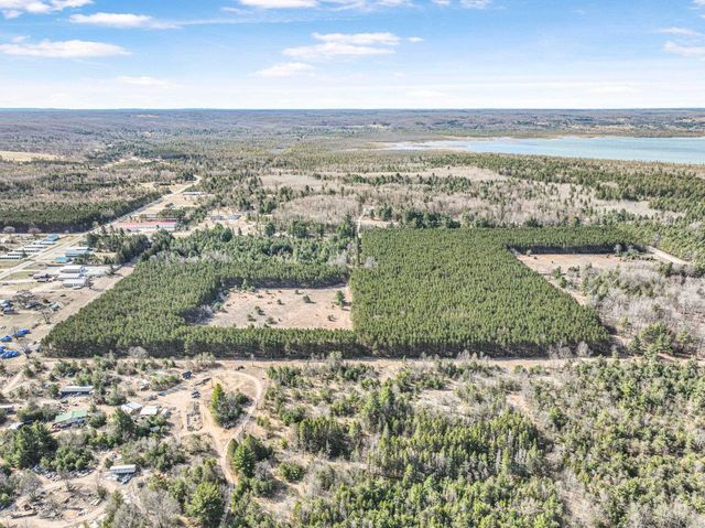 7020 NW Round Lake Road, Rapid City, MI 49676